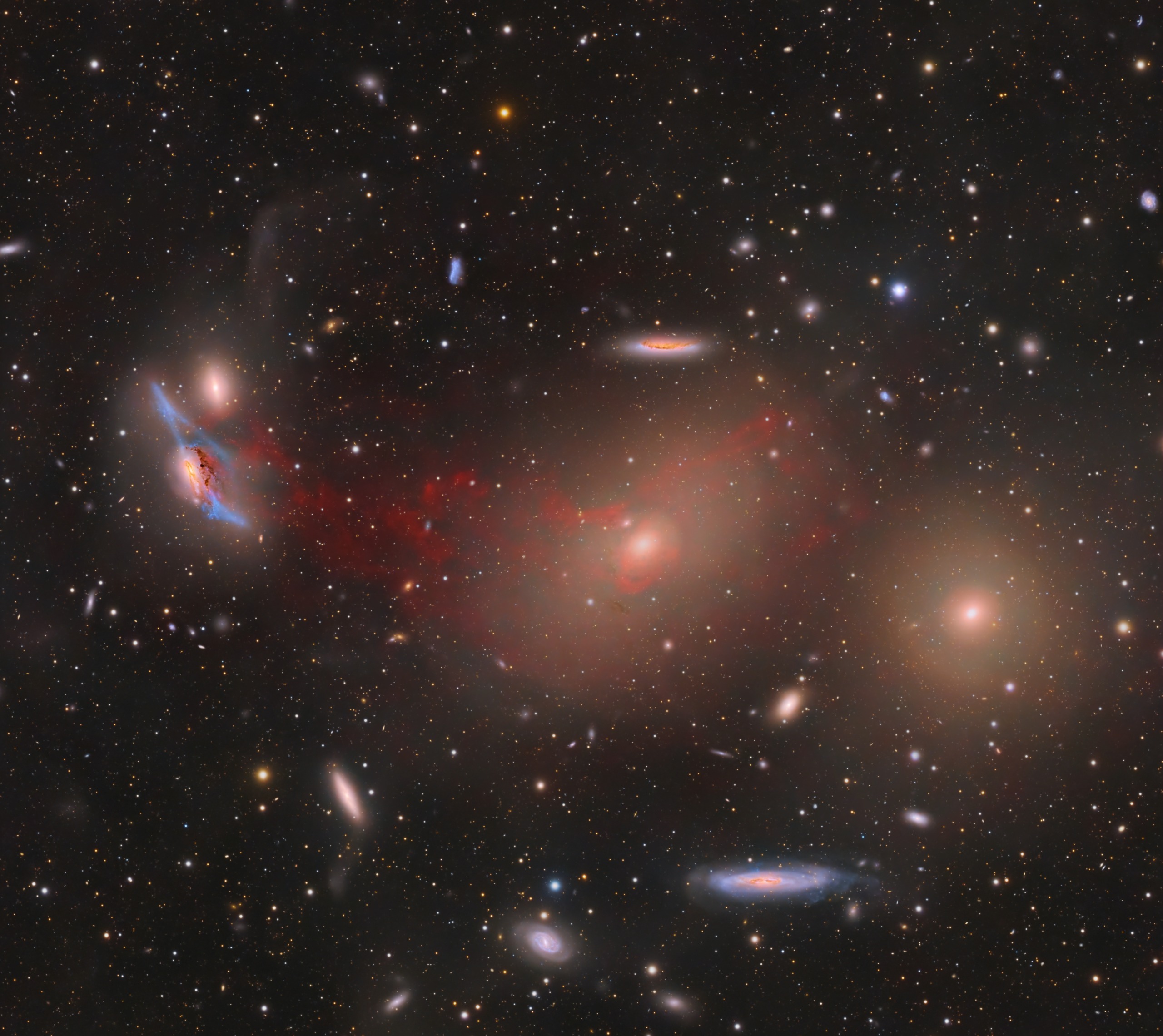 Virgo Cluster – Gas Stripped Between Galaxies